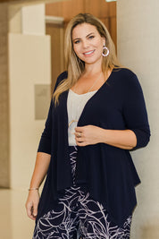 Model Fiona wearing size 16 of The Drape Cardi in colour Navy (Blue), from the front, showing the whole outfit
