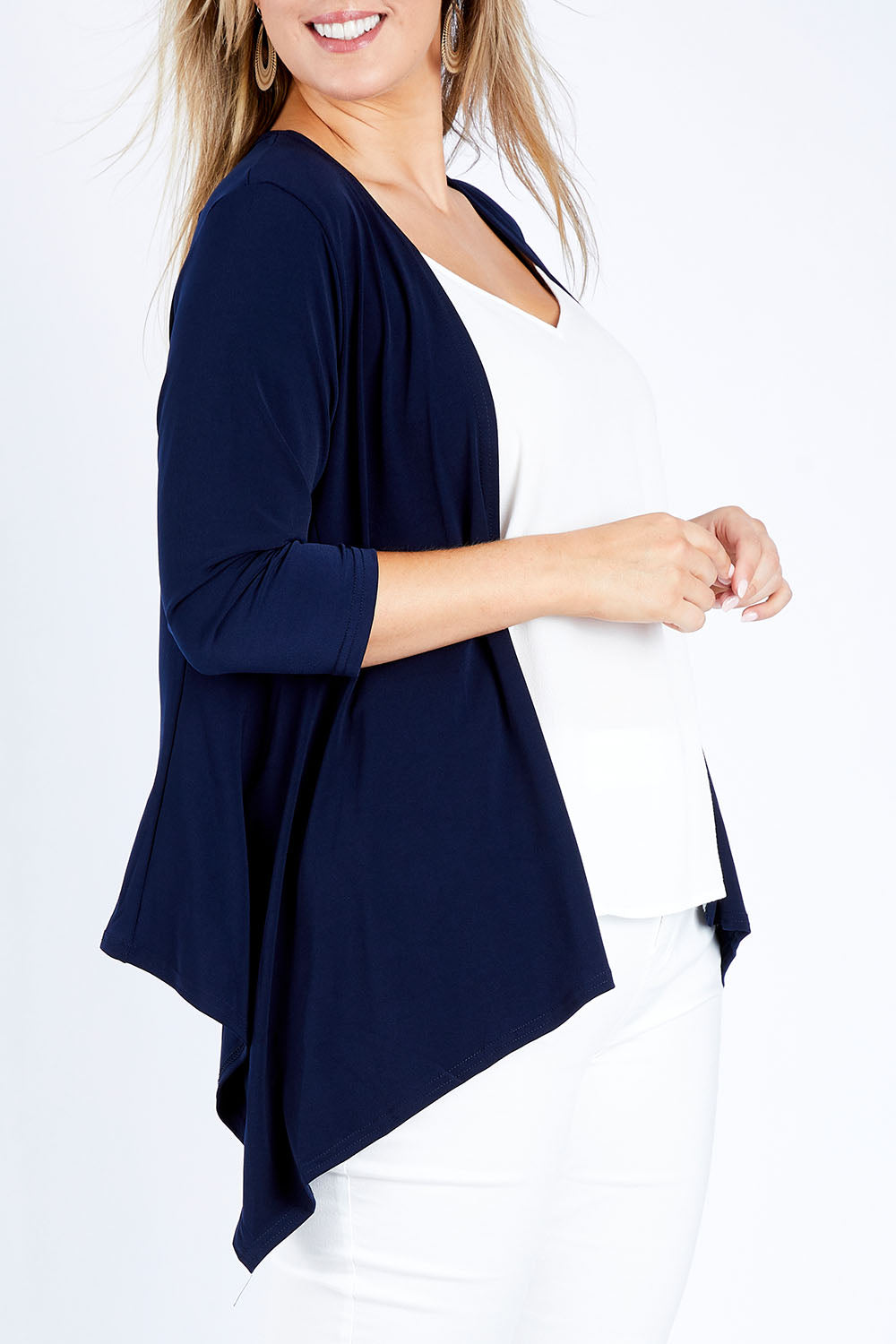 Model Jess wearing size 14 of The Drape Cardi in colour Navy (Blue), from the front, cropped image
