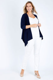 Model Jess wearing size 14 of The Drape Cardi in colour Navy (Blue), from the front, showing the whole outfit
