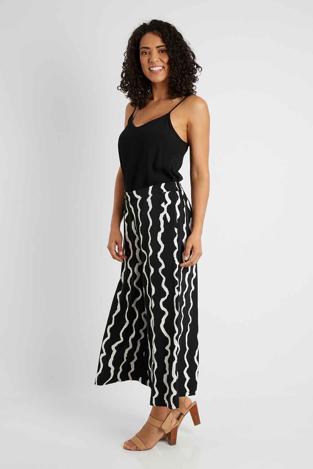Model Pamela wearing size 10 of The Luxe Printed Pull On Culottes in colour Squiggle (Black), from the front, showing the whole outfit