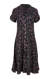 Product shot of The Printed Cotton V Neck Dress in colour Ditsy (Black), from the front