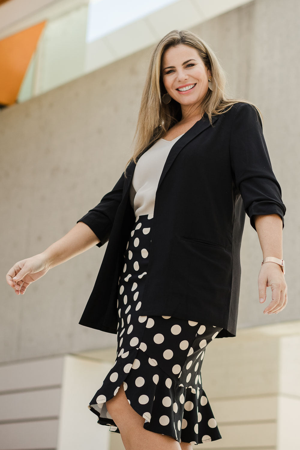 Model Fiona wearing size 16 of The Soft Fall Ruched Sleeve Blazer in colour Black (Black), from the front, showing the whole outfit