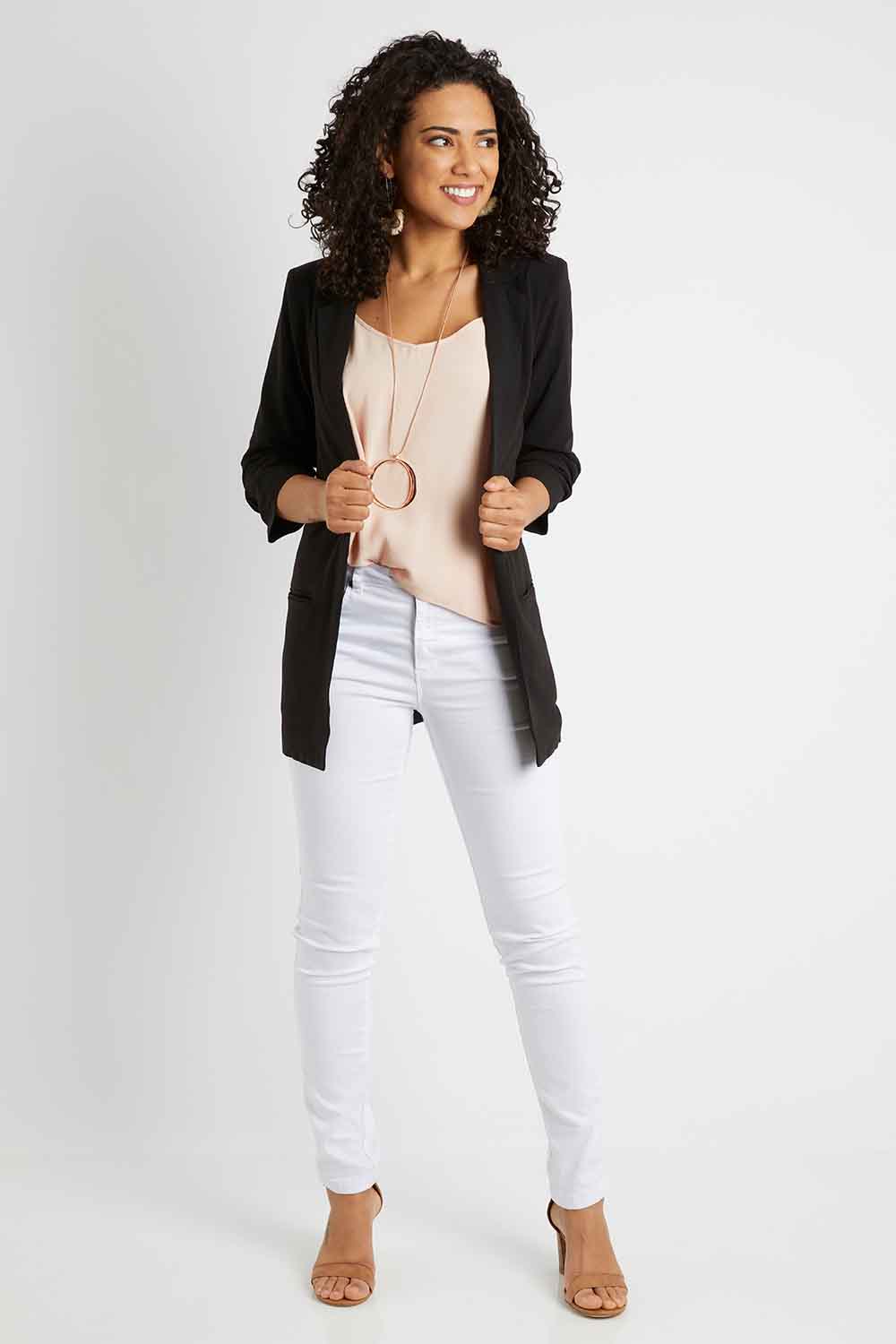 Model Pamela wearing size 10 of The Soft Fall Ruched Sleeve Blazer in colour Black (Black), from the front, showing the whole outfit