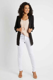 Model Pamela wearing size 10 of The Soft Fall Ruched Sleeve Blazer in colour Black (Black), from the front, showing the whole outfit