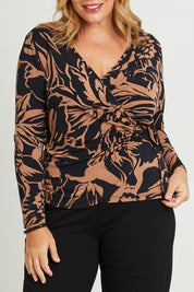 Model Fiona wearing size 16 of The Printed Side Ring Detail Blouse in colour Tanfleur (Black), from the front, cropped image