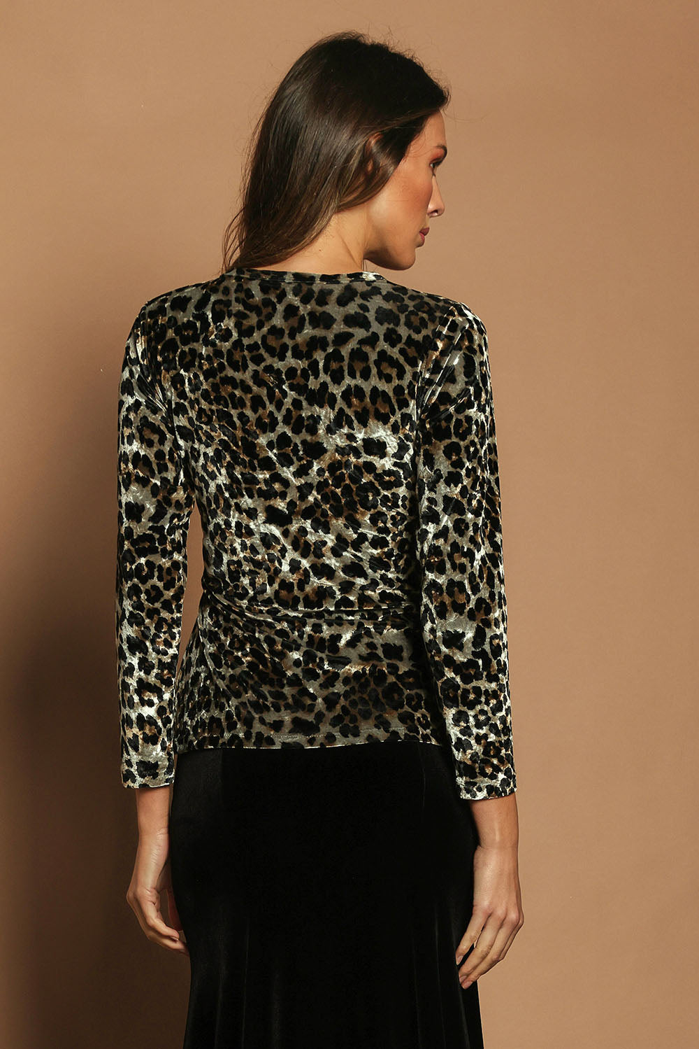 Model Madeline wearing size 10 of The Printed Velvet Side Ring Detail Top in colour Leopard (Black), from the back