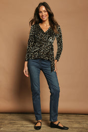 Model Madeline wearing size 10 of The Printed Velvet Side Ring Detail Top in colour Leopard (Black), from the front, showing the whole outfit