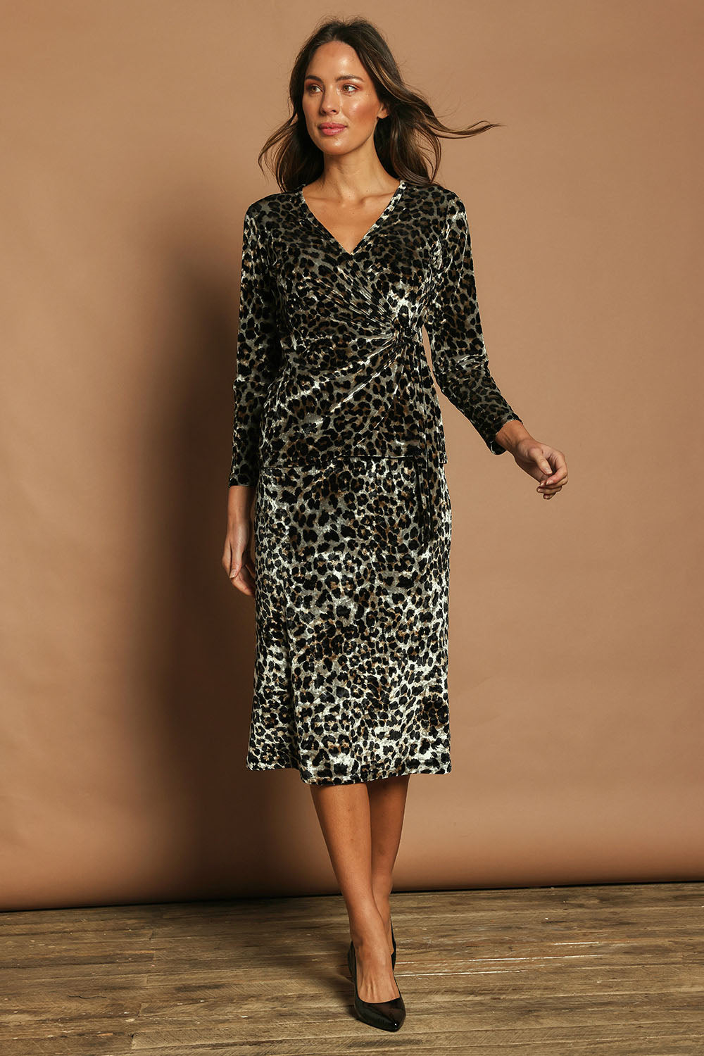 Model Madeline wearing size 10 of The Printed Velvet Side Ring Detail Top in colour Leopard (Black), from the front, showing the whole outfit