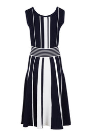 Product shot of The Reversible Knit Dress in colour Navystripe (Blue), from the back