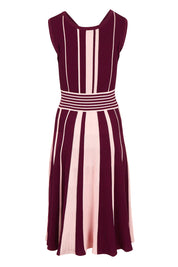 Product shot of The Reversible Knit Dress in colour Plumstripe (Purple), from the back