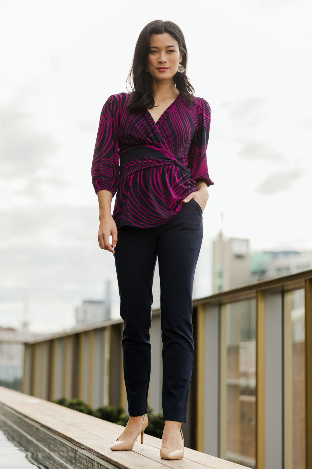 Model Miranda wearing size 10 of The High Rise Pull On Ponte Pant in colour Navy (Blue), from the front, showing the whole outfit