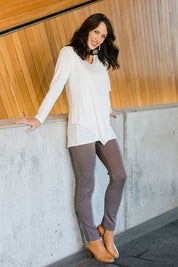 Model Andrea wearing size 10 of The High Rise Pull On Ponte Pant in colour Taupe, from the front, showing the whole outfit
