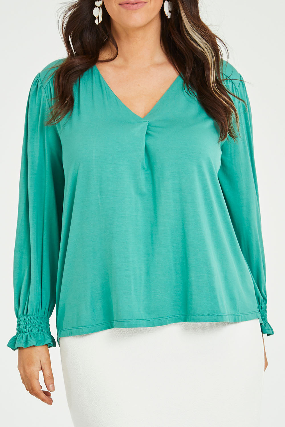 Model Laura wearing size 14 of The Modal Top in colour Jade (Green), from the front, cropped image