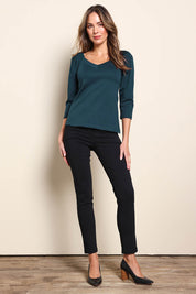 Model Madelinec wearing size 10 of the The Define Ponte Top – Lagoon in colour Lagoon, from the front