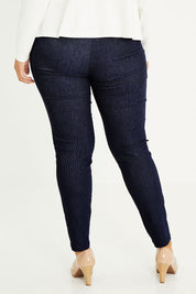 Model Palatina wearing size 16 of The Stretch Tapered Pull On Pant in colour Navy (Blue), from the back
