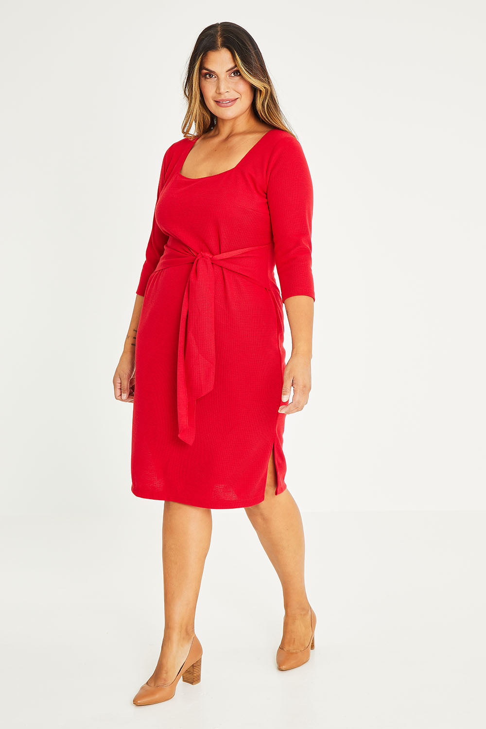 Model Palatina wearing size 16 of The Square Neck Tapered Dress in colour Red (Red), from the front, showing the whole outfit