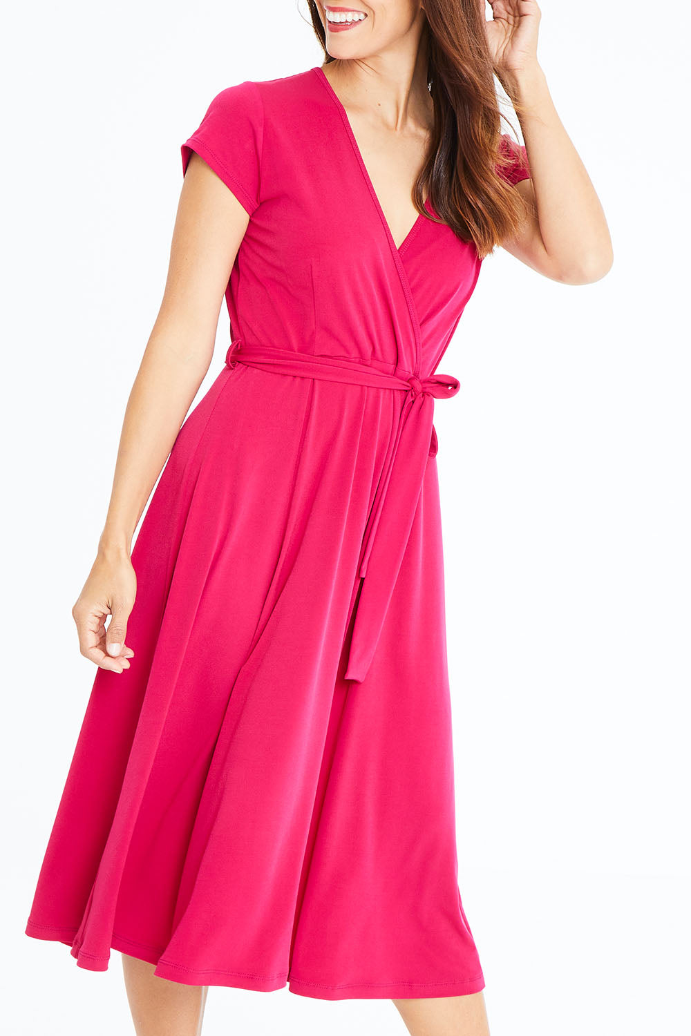 Model Cara wearing size 10 of The Fit And Flare Jersey Dress in colour Cerise (Pink), from the front, cropped image