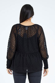 Model Sasha-Lee wearing size 16 of The Smocked Cuff Lace Blouse in colour Black (Black), from the back