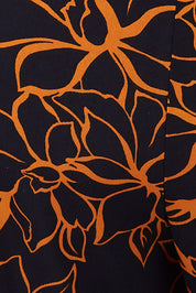Product shot of The Printed Cross Over Pant in colour Navyfloral (Blue), detail