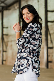 Model Miranda wearing size 10 of The 3/4 Sleeve Cotton Shirt in colour Leaf (Blue), from the front, showing the whole outfit