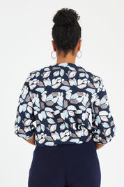 Model Noli wearing size 14 of The 3/4 Sleeve Cotton Shirt in colour Leaf (Blue), from the back