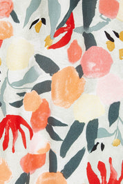 Product shot of The Lined Kimono Sleeve Ruffle Hem Dress in colour Orchard, detail