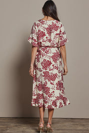 Model Amanda wearing size 10 of The Lined Kimono Sleeve Ruffle Hem Dress in colour Winebloom (Red), from the back