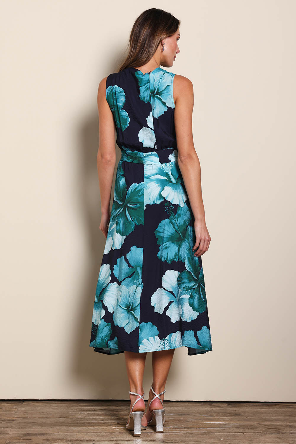 Model Madelinec wearing size 10 of the The Printed Adore Dress - Greenhibiscus in colour Greenhibiscus, from the front