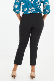 Model Noli wearing size 14 of The 7/8 Pocket Pull On Pant in colour Black (Black), from the back