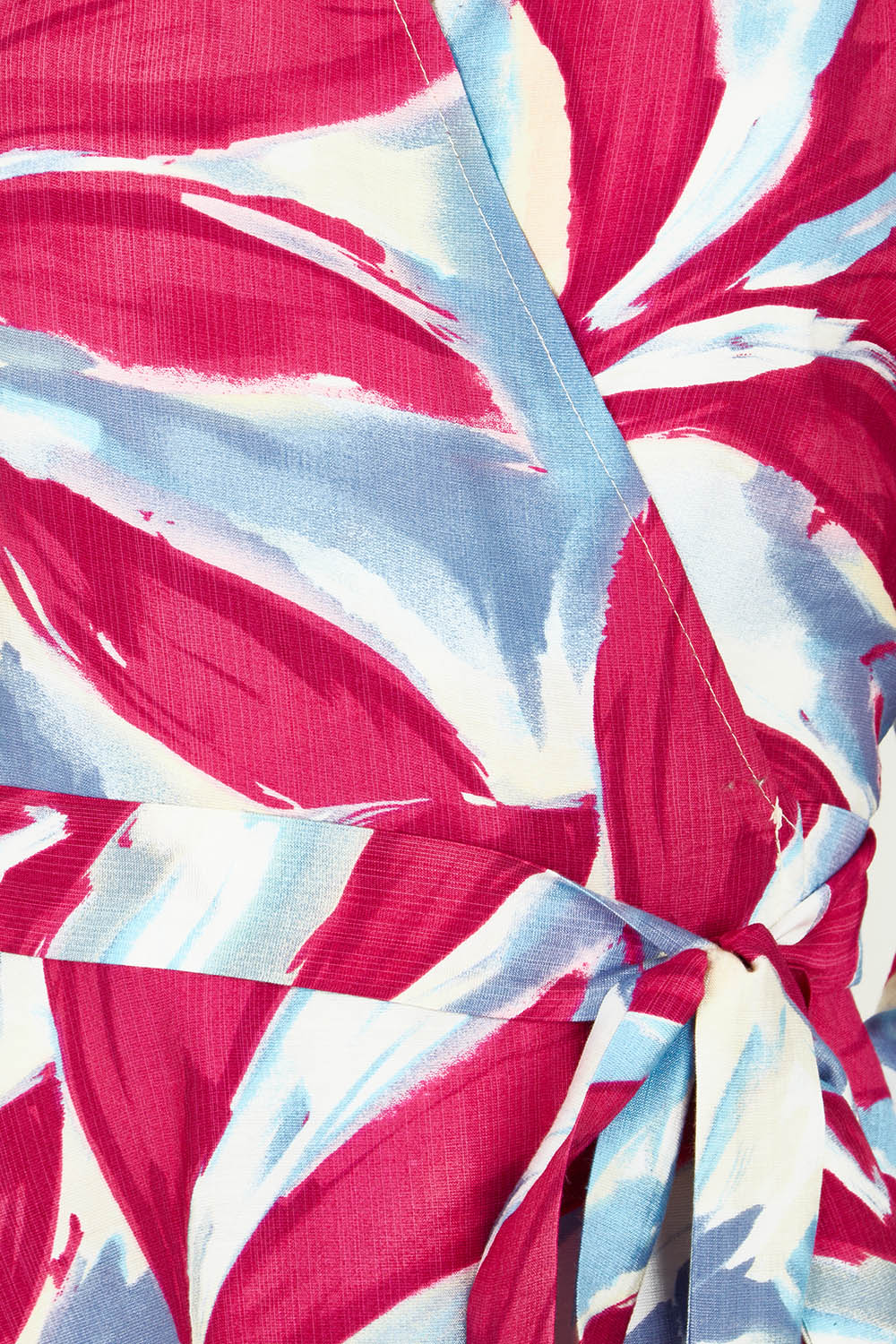 Product shot of The Printed Blouson Sleeve Wrap Blouse in colour Pinkleaf (Pink), detail