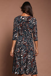 Model Amanda wearing size 10 of The 3/4 Sleeve Printed Jersey Dress in colour Butterfly, from the back