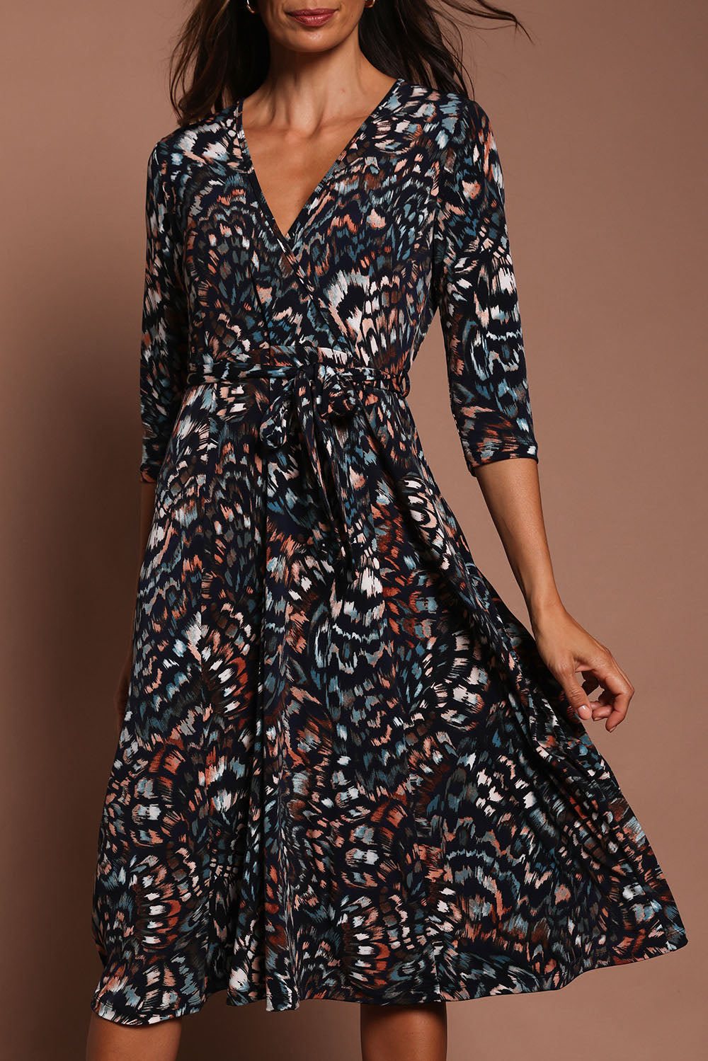 Model Amanda wearing size 10 of The 3/4 Sleeve Printed Jersey Dress in colour Butterfly, from the front, cropped image