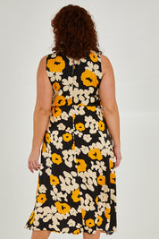 Model Maddy wearing size 16 of The Printed Roll Neck Dress in colour Flower (Black), from the back
