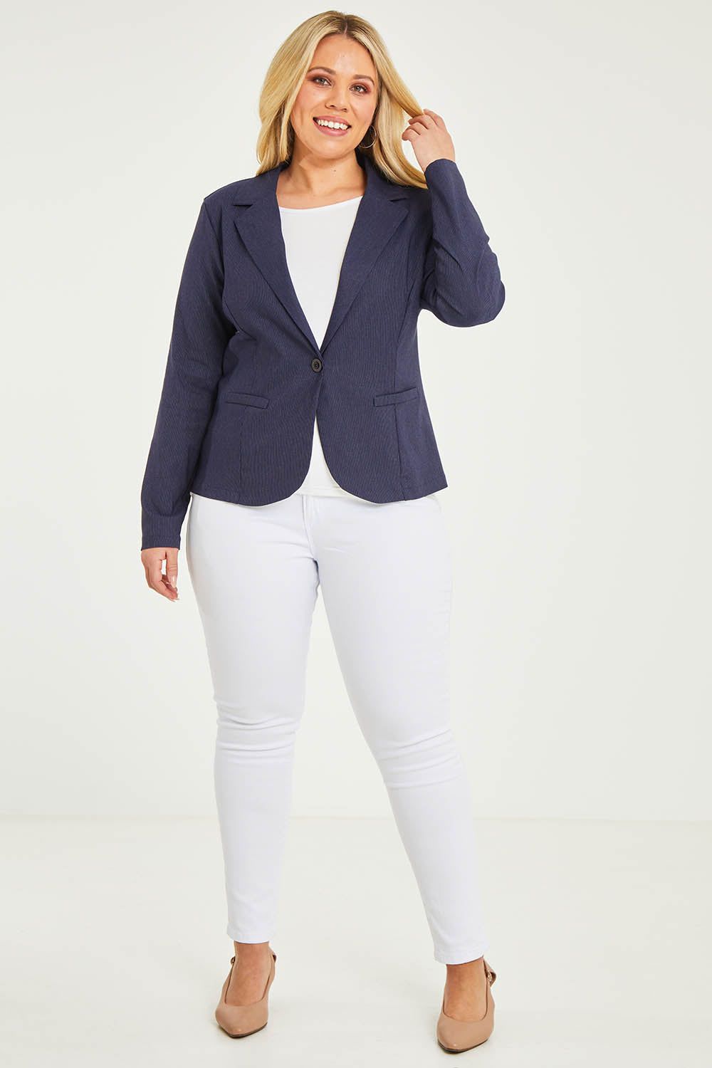 Model Katie wearing size 16 of The Stretch Classic Blazer in colour Navy (Blue), from the front, showing the whole outfit
