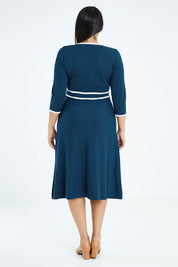 Model Sasha-Lee wearing size XL of The Contrast Trim Knit Dress in colour Petrol (Blue), from the back