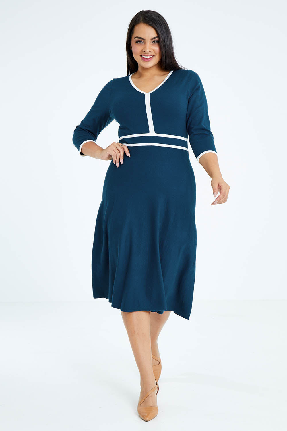 Model Sasha-Lee wearing size XL of The Contrast Trim Knit Dress in colour Petrol (Blue), from the front, showing the whole outfit