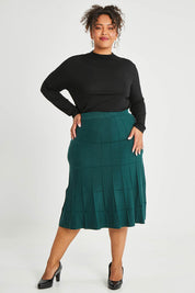 Model Alexis wearing size XL of The Midi Textured Knit Skirt in colour Tealgreen (Green), from the front, showing the whole outfit