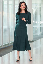 Model Miranda wearing size S of The Midi Textured Knit Skirt in colour Tealgreen (Green), from the front, showing the whole outfit