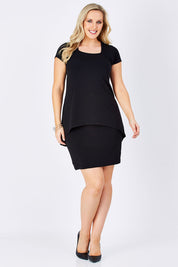 Model Jess wearing size 12 of The Short Sleeve Rita Dress in colour Black (Black), from the front, showing the whole outfit