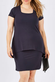Model Ljubenka wearing size 18 of The Short Sleeve Rita Dress in colour SmokeyGrey (Grey), from the front, cropped image