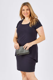 Model Ljubenka wearing size 18 of The Short Sleeve Rita Dress in colour SmokeyGrey (Grey), from the front, cropped image