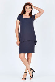 Model Rebecca wearing size 10 of The Short Sleeve Rita Dress in colour SmokeyGrey (Grey), from the front, showing the whole outfit