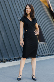 Model Andrea wearing size 10 of The Cap Sleeve Ponte Lapel Dress in colour Black (Black), from the front, showing the whole outfit