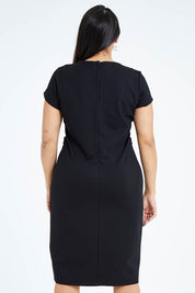 Model Sasha-Lee wearing size 10 of The Cap Sleeve Ponte Lapel Dress in colour Black (Black), from the back