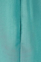 Product shot of The Buckle Detail Faux Wrap Dress in colour Lagoon (Green), detail