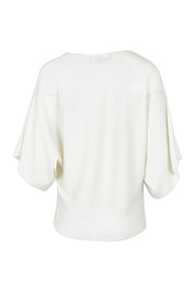 Product shot of The Transeasonal Kimono Knit in colour Snow (White), from the back