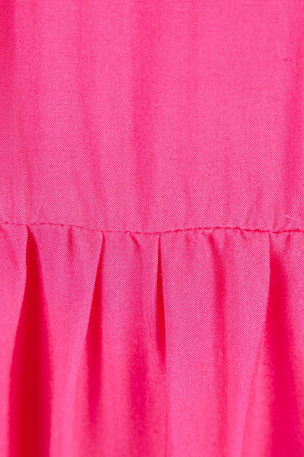Product shot of The Ruffle Tier Dress in colour Brightpink (Pink), detail