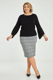 Model Fiona wearing size XL of The Cotton Cashmere Angled Sleeve Knit in colour Black (Black), from the front, showing the whole outfit