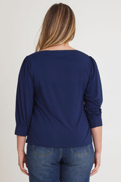 Model Chanel wearing size 16 of The Bamboo Boat Neck Top in colour Navy (Blue), from the back
