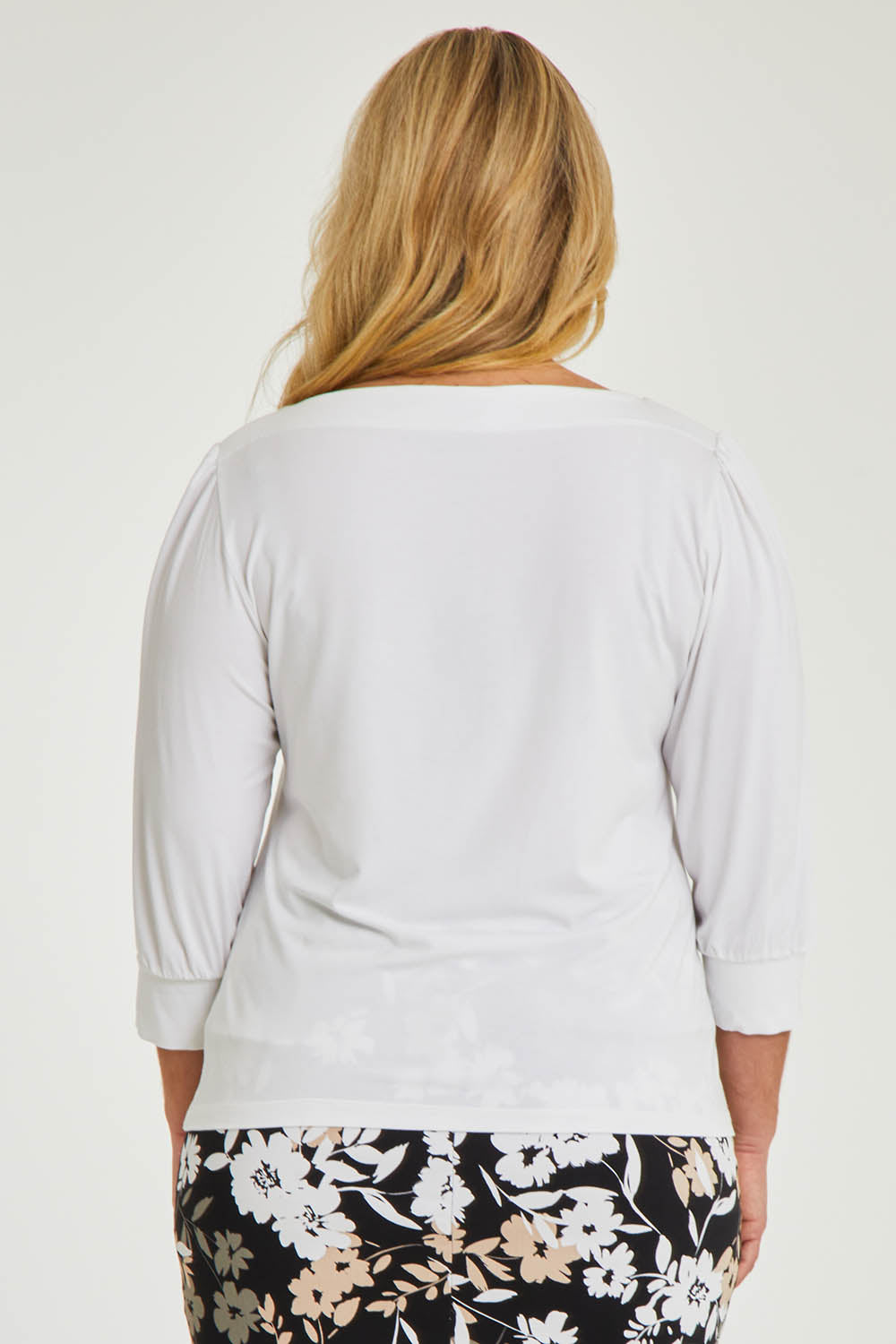 Model Katie wearing size 16 of The Bamboo Boat Neck Top in colour Snow (White), from the front, cropped image